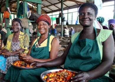 Women workers processing palm kernels