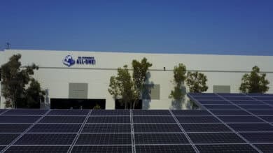 On top of solar panels in a parking lot